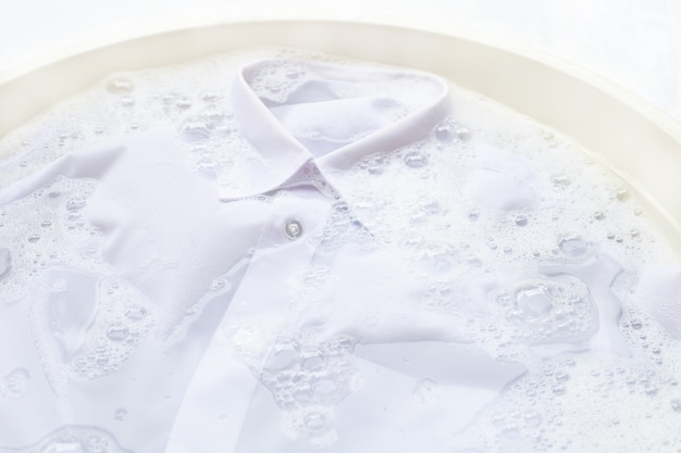 Soak  cloth before washing, white shirt