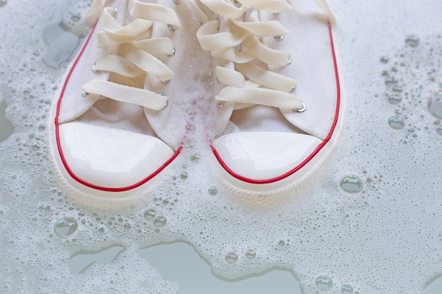 Soak shoes before washing