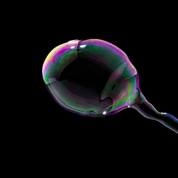 Soap Bubble in colorful colors on black background