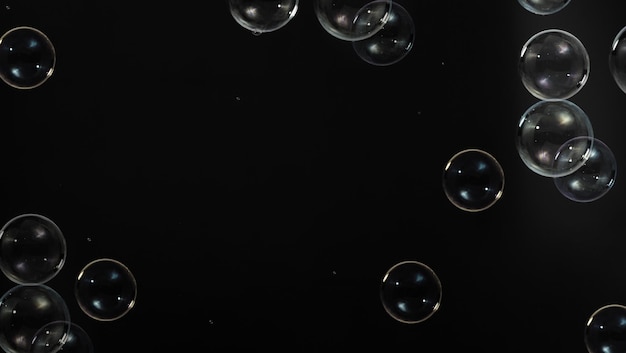 Photo soap bubble drop or shampoo bubbles floating like flying in the air