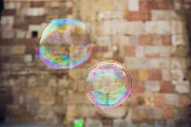 Soap bubbles against the city hall.