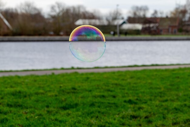 Photo soap bubbles near by the rivier