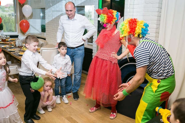 Photo soap bubbles show clowns at children's party