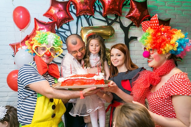 Soap bubbles show clowns at childrens party