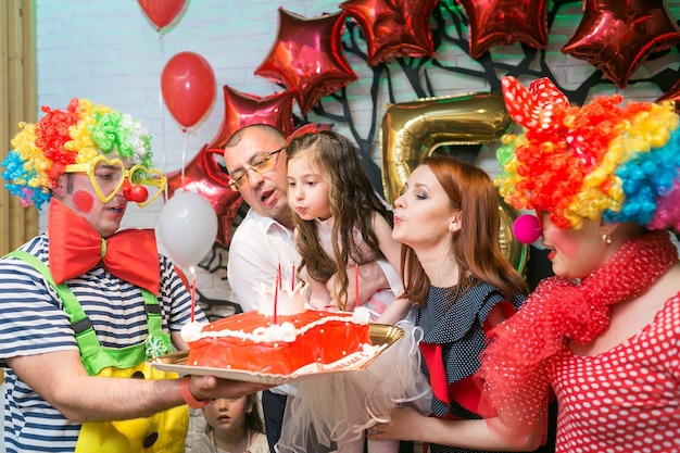 Soap bubbles show clowns at childrens party