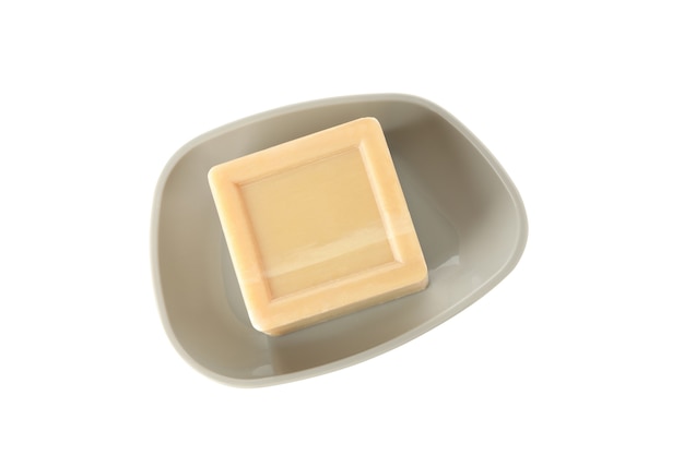 Soap dish with soap on white surface