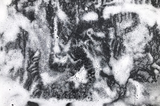 Soap foam on a black background, foam texture