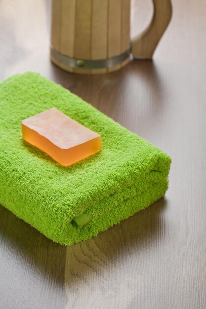 Soap on towel with mug