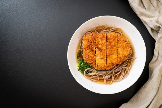 Soba ramen noodle with Japanese fried pork cutlet (tonkatsu). Asian food style