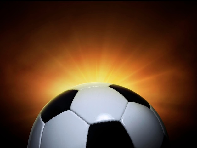 Soccer ball ball on black background with smoke yellow orange red white colored back lights