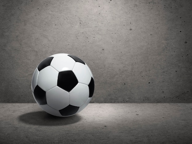 Soccer ball on cement wall background