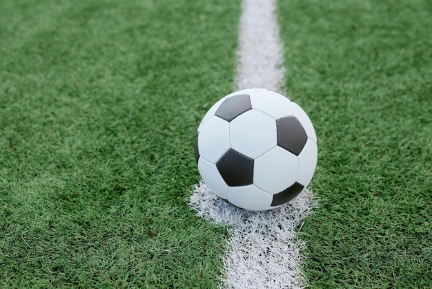 Soccer ball in the center of the field at the start of the game