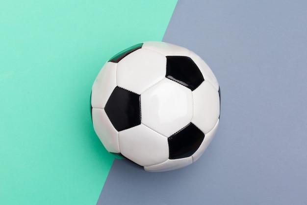 Photo soccer ball on a color background