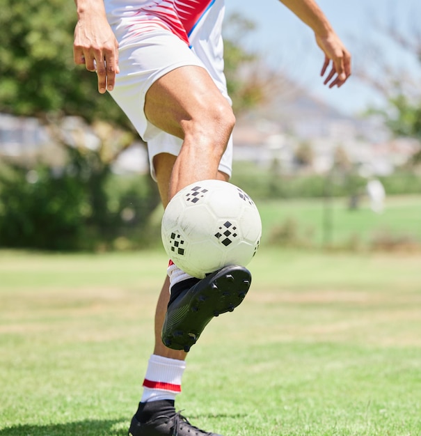 Photo soccer ball control soccer player and practice skill on football field competition games or sports training on stadium grass pitch football player feet athlete action and talent for goals on turf