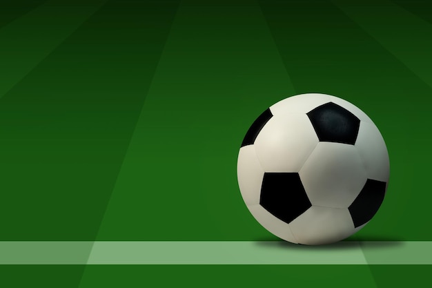 Photo soccer ball on green grass with copy space for text