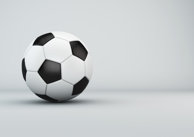 Soccer ball on white wall