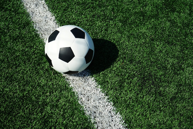 Soccer ball with green glass