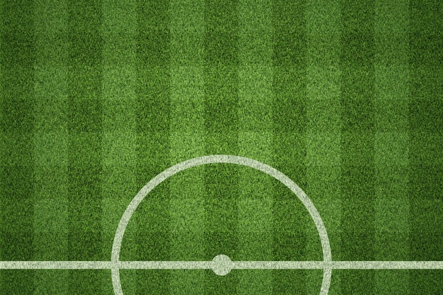 Photo soccer field or football field on green grass background