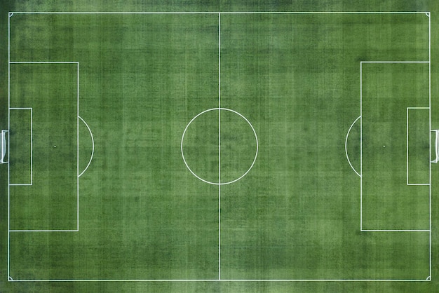 Фото Футбольное поле футбольное поле зеленая трава фоне футбольного поле