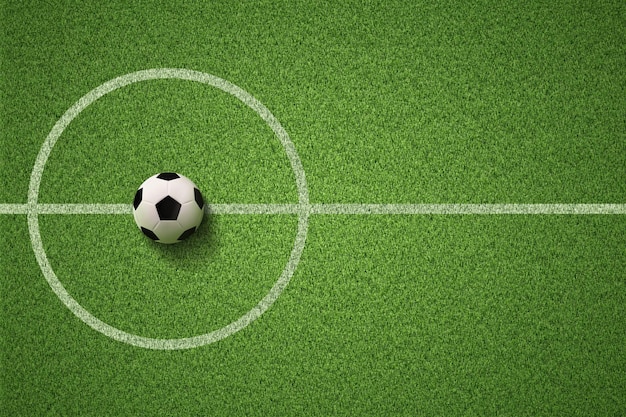 Photo soccer field or football field with soccer ball on green grass background