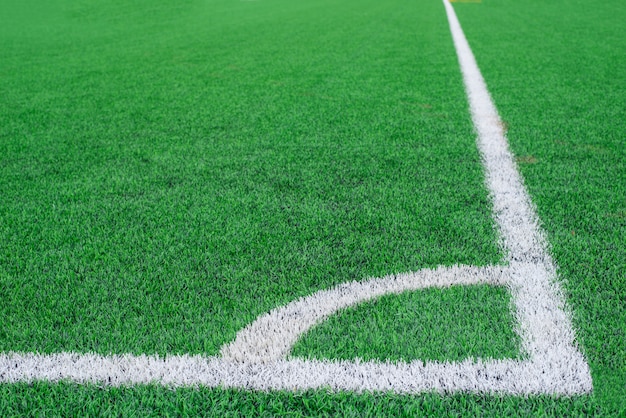 Soccer field grass conner.pattern of fresh green grass for football