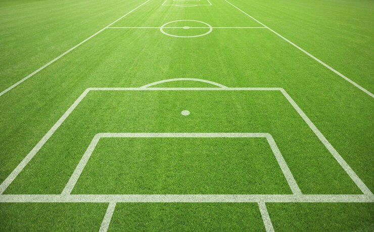 Photo soccer field with green grass sport lawn background