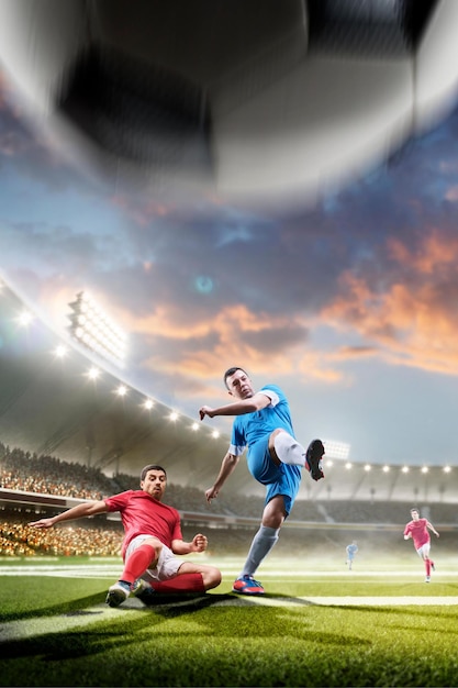 Soccer player in action on night stadium background