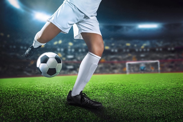 soccer player in action on sport stadium background
