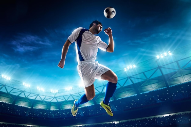 A soccer player is in the air and is about to kick the ball.