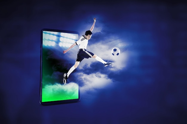 Soccer player jumping out from cellphone screen