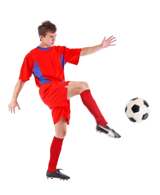 Soccer player kicking the ball