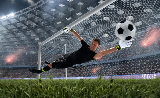 Photo soccer players in action on professional stadium