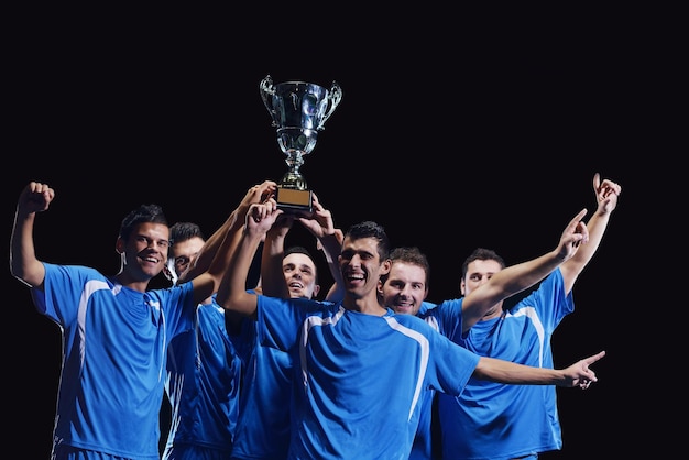 soccer players celebrating victory