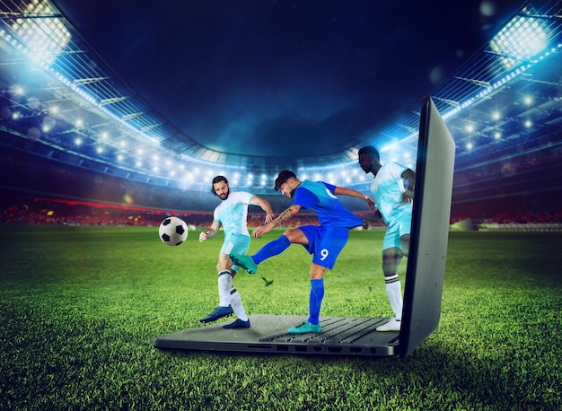 축구 선수는 TV 스트리밍의 노트북 개념으로 플레이합니다.