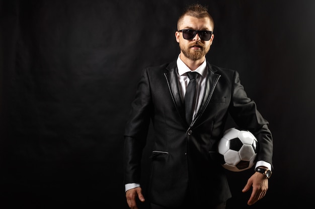 Soccer sport manager in business suit