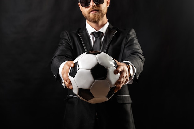 Soccer sport manager in business suit