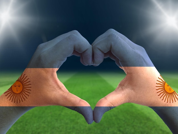 축구 팀 지원 기호입니다. 손 사랑 모양으로 고립 된 아르헨티나 국기. 축구 서포터즈 포스터