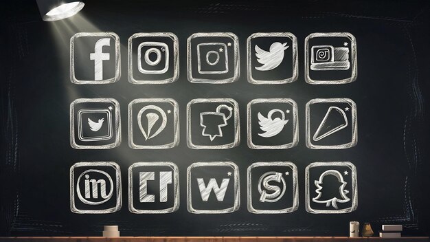 Photo social media applications with drawn web icons on chalkboard