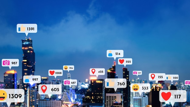 Social media icons fly over city downtown showing people reciprocity connection