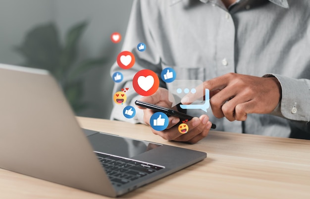 Social media marketing ideas on mobile phones Emoji icons and online messages