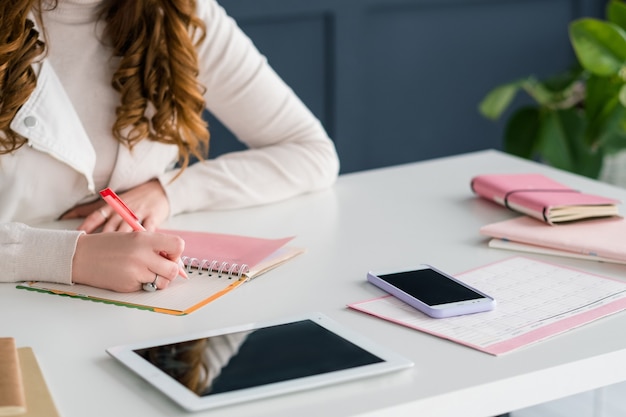 social media marketing. smm expert woman scheduling job. agenda priorities. 