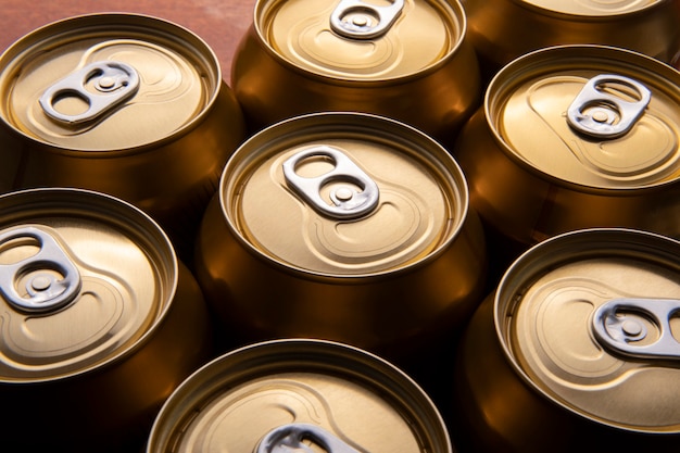 Soda and beer aluminum cans Top view in back light