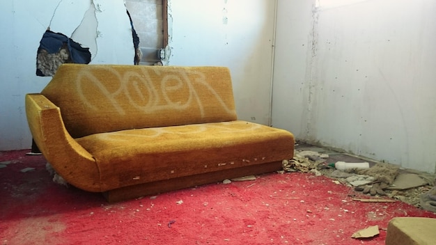 Photo sofa in abandoned house