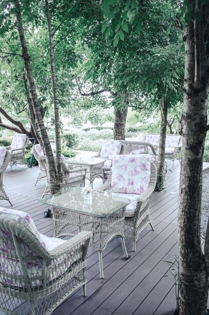 Sofa the balcony with garden view Table with chair and beautiful sunlight on summer