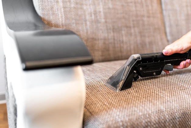 Sofa cleaning with professional steam cleaner