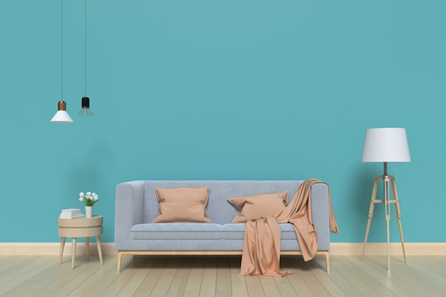 青い壁のリビングルームにあるソファー