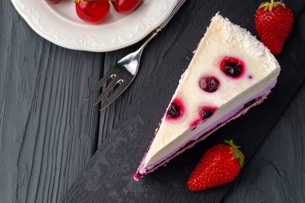 Soft berry souffle cake decorated with berries