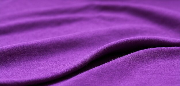 Soft creases on shiny fabric silk satin background beautiful luxurious background web banner