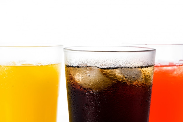 Soft drinks of different flavors for summer isolated, top view