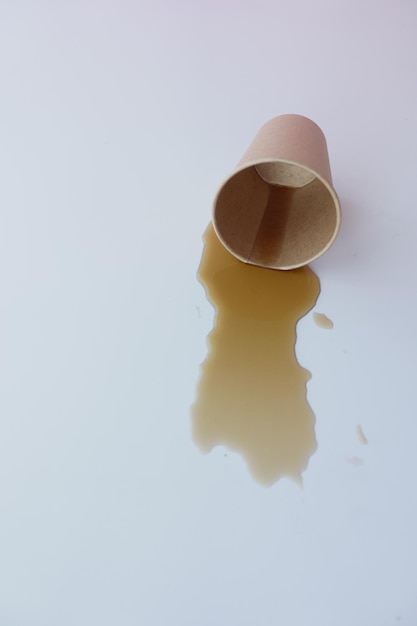 Photo soft drinks or liquid spilled on a floor